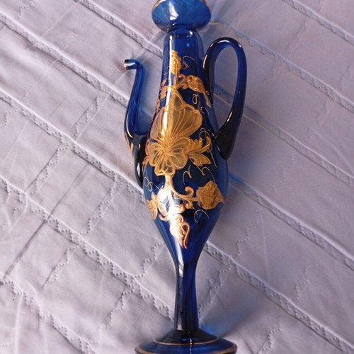 Vintage cobalt blue decorative vase with gold floral motifs