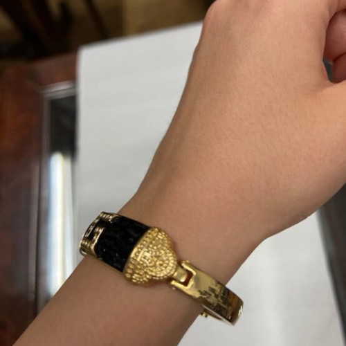 Bracelet like new with black and gold design