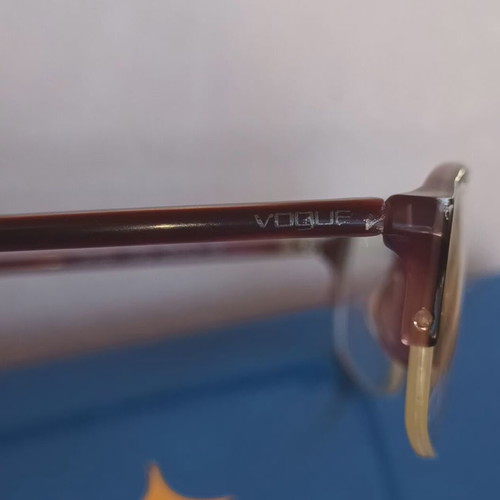 Vogue eyeglass frame like new, purple