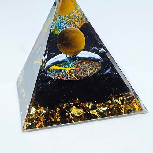 Orgonite pyramid with Tiger's Eye and Tree of Life like new