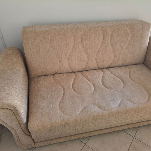 Two-seater sofa bed, beige fabric with storage