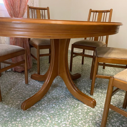 Oval dining table with 6 chairs used, with extensions