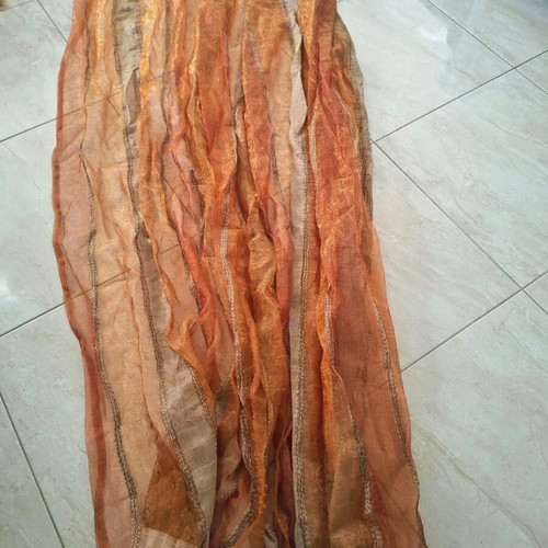 Organza curtain in earthy orange tones