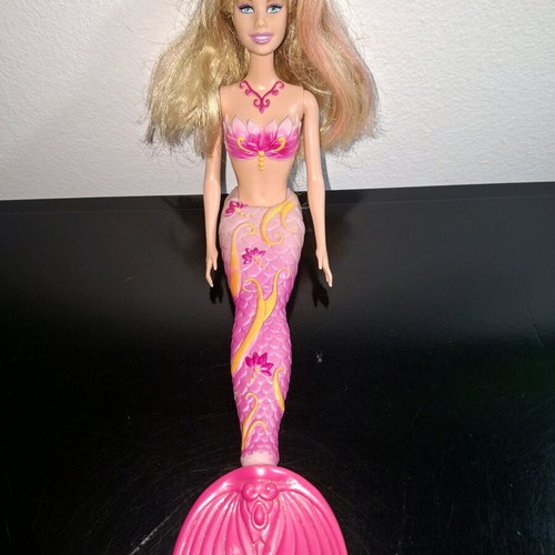 Barbie mermaid used with cut tuft