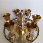 Antique silverware set used with trays, jug, and glasses