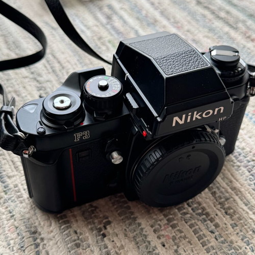 Nikon F3 HP camera like new with 2 lenses and leather strap