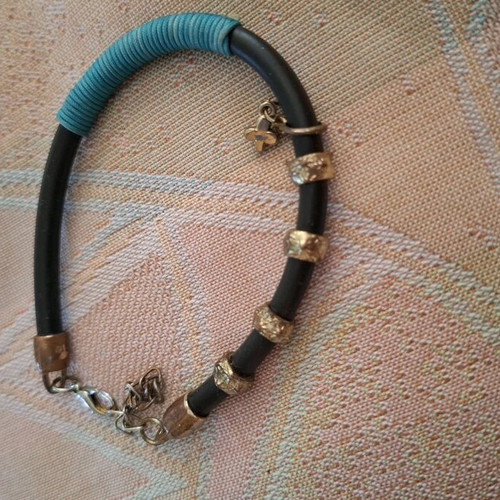 Women's bracelet used rubber with cross charm