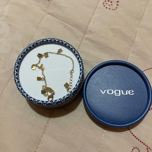Vogue bracelet gold plated like new with square charms