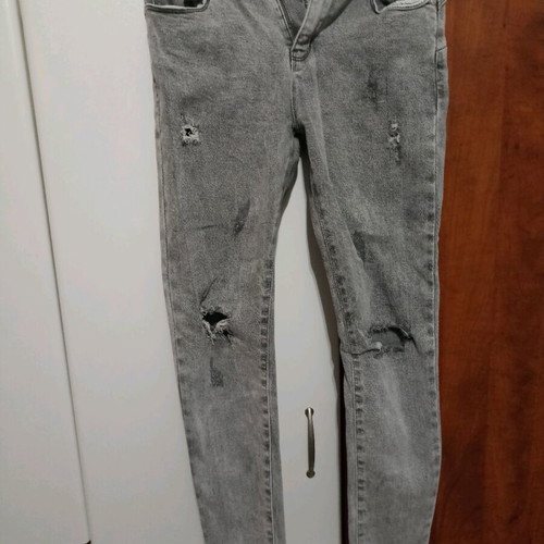 Grey high-waisted jeans with rips like new, size M