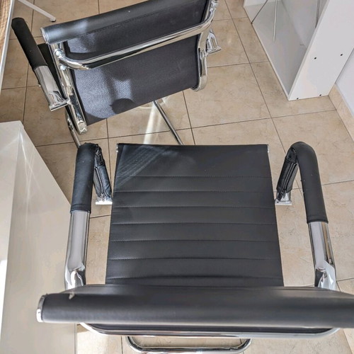Black office visitor chairs used, set of 2