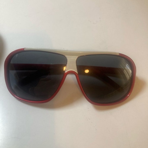 Children's sunglasses used with red frame and white detail