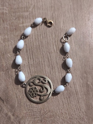 Silver bracelet new with white beads and metal detail