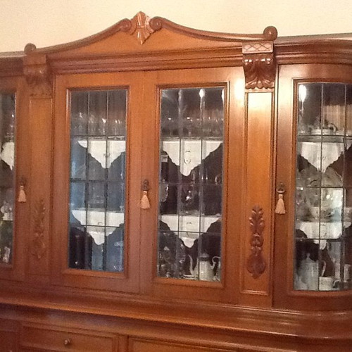 Handmade walnut display cabinet like new with crystal doors