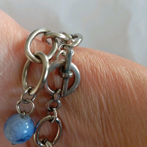 Handmade bracelet with blue stones and silver details