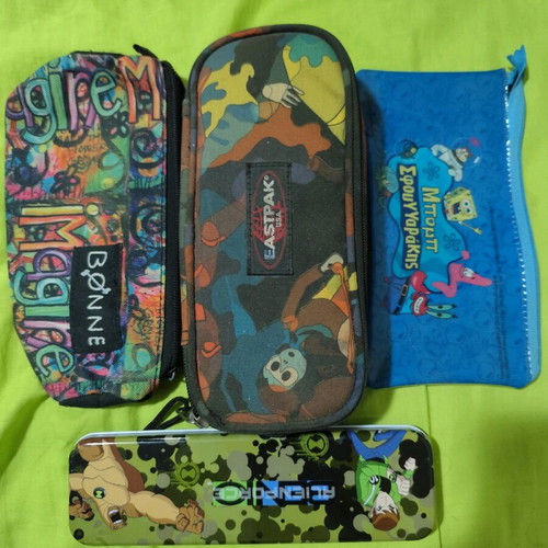 Pens and mechanical pencils used, with cases, erasers, sharpeners