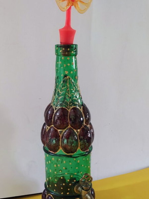 Glass bottle with colored tap like new, hand decorated