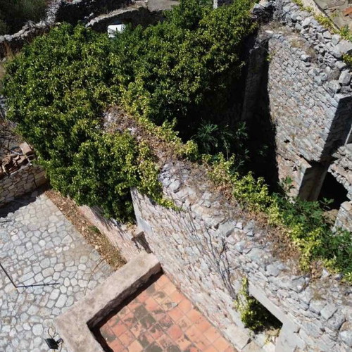 Kapetanospito building from 1876 in Areopoli Mani with sea view