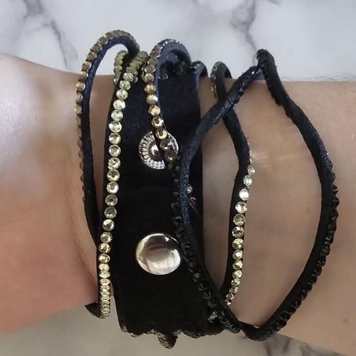 Black suede bracelet with black and beige stones
