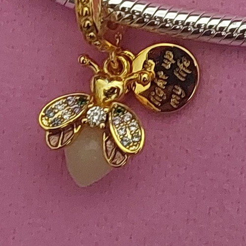 Charm bee pendant new with white and gold zirconia, glows in dark