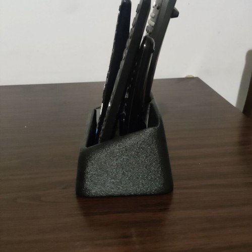 Remote organiser small for up to 4 remotes new