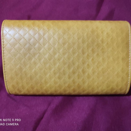 Women's mango yellow envelope bag with quilted surface and gold chain