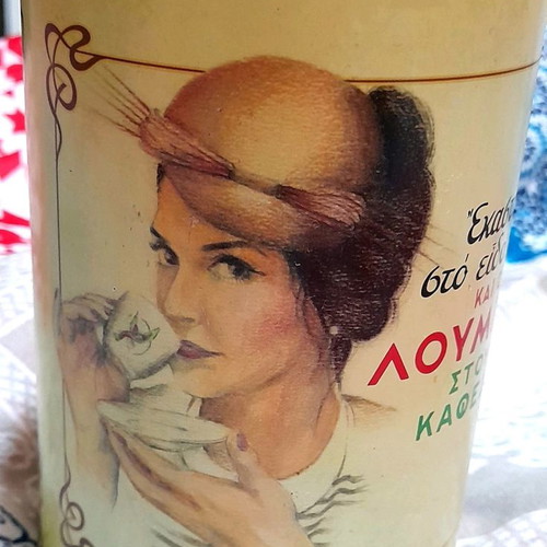 Metal coffee tin Loumidis used