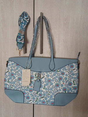 Handbag with strap