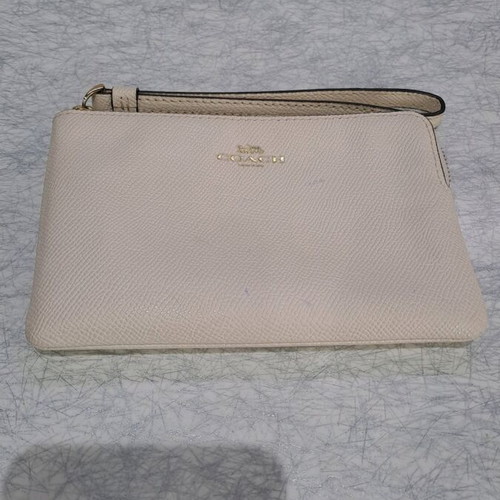 Coach wristlet bag used, beige with strap