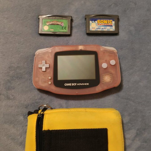 Nintendo Gameboy Advance Fuchsia like new with Warioland 4 and Sonic Advance