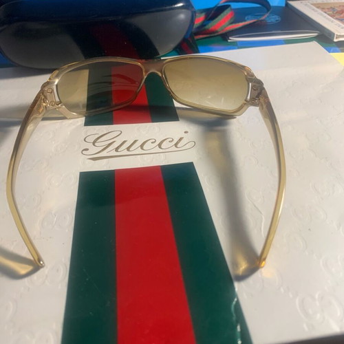 Gucci sunglasses like new, gold-colored acetate frame with case and bag