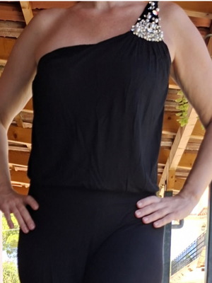 Women's jumpsuit used, size L, black with stones and zipper