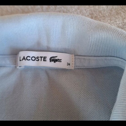 Lacoste light blue polo shirt size 34
