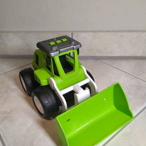 Children's tractor toy with loader used with sounds