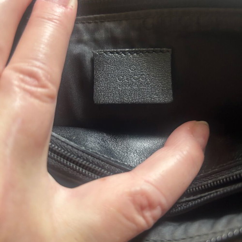Gucci wallet used, black with zipper and compartments