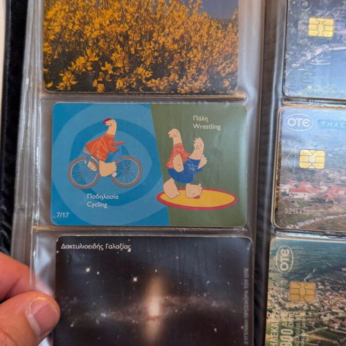 Vintage OTE phone card collection in black album