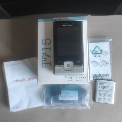 Sony Ericsson T715 box with original accessories and non-working device used