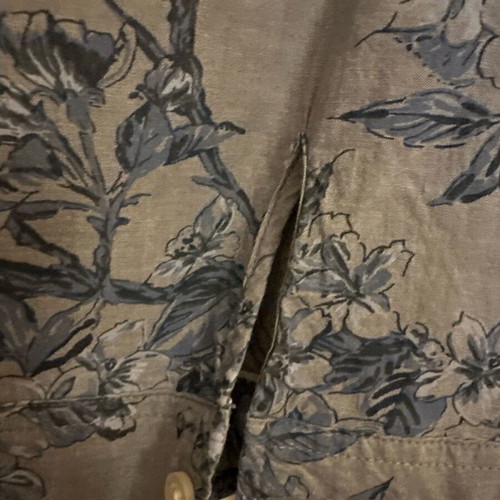 Blue shirt used with button on sleeve
