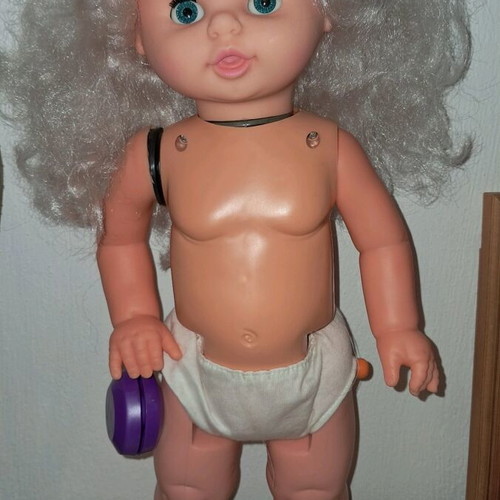 Vintage Anna doll with yo-yo in hand used