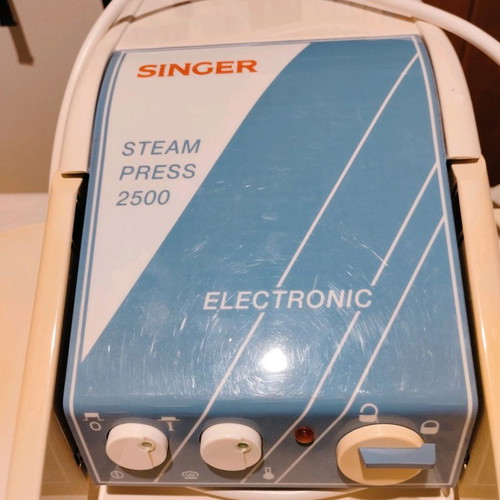 Singer steam press used with pads