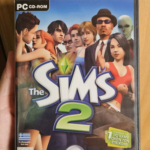 The Sims 2 PC game used, simulation
