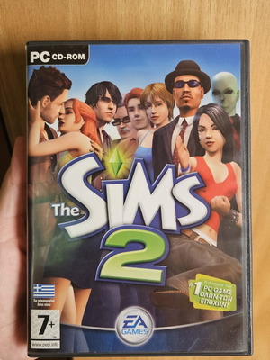 The Sims 2 PC game used, simulation