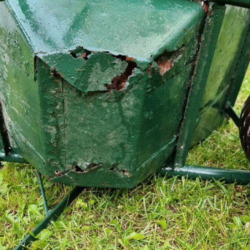 Garden wheelbarrow used with rust holes, sturdy frame and functional wheel