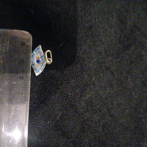 Silver evil eye pendant like new, turquoise and silver