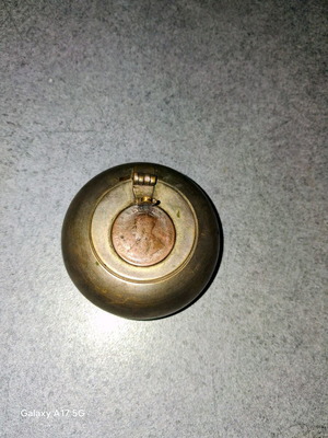 Brass vintage pocket ashtray used with old coin