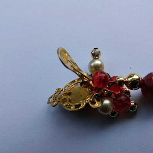 Button earrings used with red beads