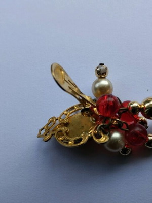 Button earrings used with red beads