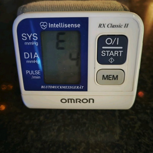 Omron blood pressure monitor like new with vibration sensor function