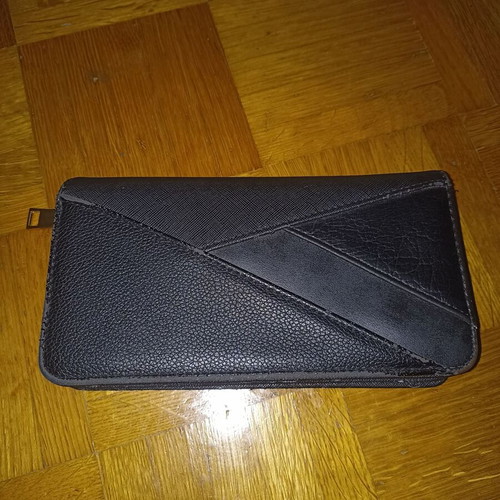 Black wallet slightly used with multiple compartments
