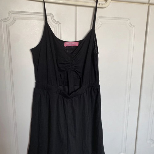 Pink Woman short romper with front opening like new, black