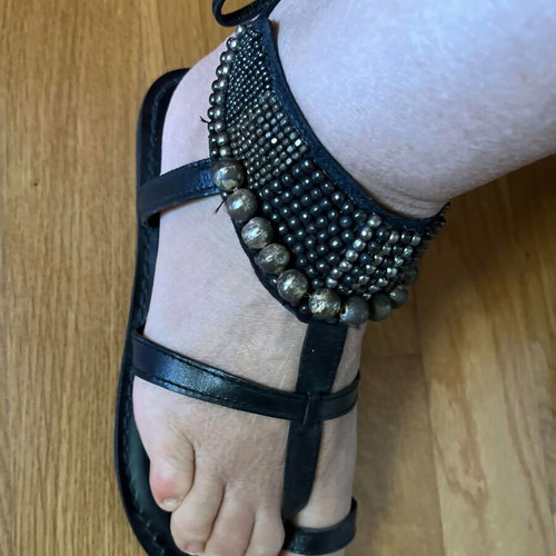 Leather vintage black sandals new, decorated with metal pearls